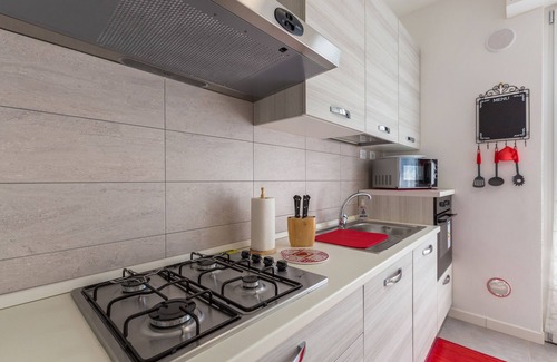 Gallaratese Apartment | Inviting Sem Benelli: Family-Friendly Stay with Breakfast