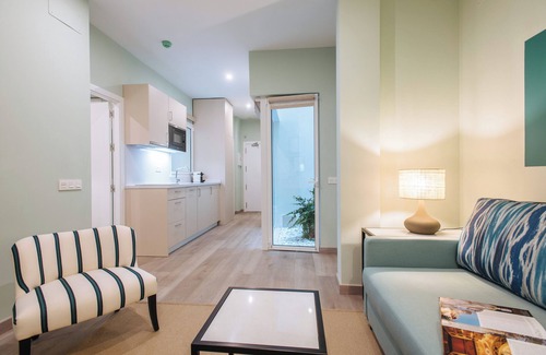 San Gil Hotel | Elegant Sercotel Sevilla Guadalquivir Suites with Pool & Spa