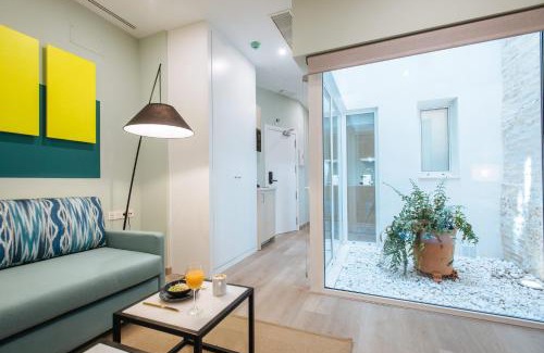 San Gil Apartment | Experience Sercotel Sevilla Guadalquivir Suites: 4-Star Comfort