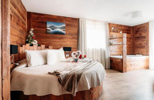 Sauze d'Oulx Hotel | Discover Serendipity Hotel: Oceanfront Haven with Hot Tub