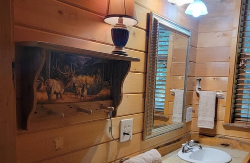 Coos Bay House | Serene Creekfront Lodge style home hidden away in Elliot National Forest