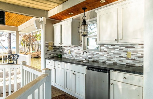 Henrico House | Idyllic Lakefront Retreat with Ocean and Lake Views