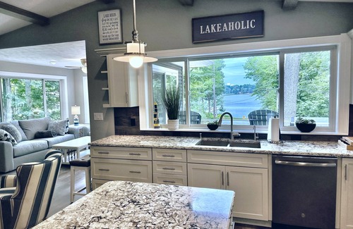 Grawn House | Tranquil Lakehouse with Private Beach & Exciting Amenities