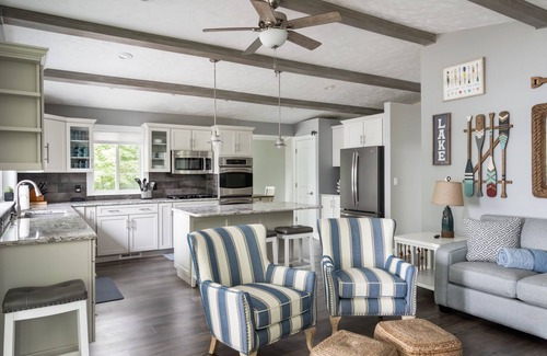 Grawn House | Tranquil Lakehouse with Private Beach & Exciting Amenities