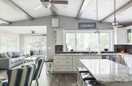 Grawn House | Tranquil Lakehouse with Private Beach & Exciting Amenities