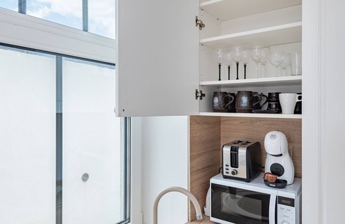 Old Town Apartment | Tranquil Nemunas River View Apartment Near McDonald's