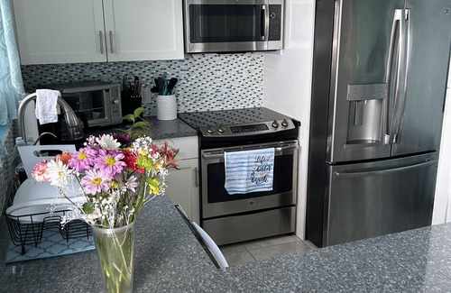 Estate Two Brothers Condo | Oceanfront Serenity by the Sea with Breathtaking Sunsets