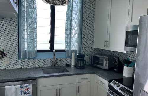 Estate Two Brothers Condo | Oceanfront Serenity by the Sea with Breathtaking Sunsets