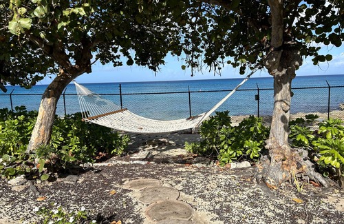 Estate Two Brothers Condo | Oceanfront Serenity by the Sea with Breathtaking Sunsets