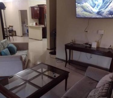 Runaway Bay Apartment | Serenity Escape: Oceanfront Retreat with Pool and Pet Friendly