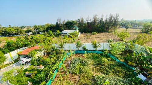 Kalpakkam Villa | Discover Serenity Farms: Family-Friendly Stay with Pool