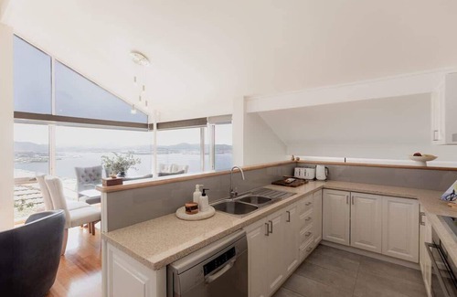 Sandy Bay House | Serenity@Sandy Bay: Family home with Hot Tub