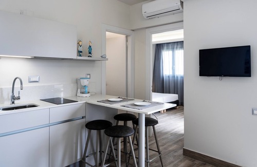 Stalida Apartment | Serene Sergiani Garden: Oceanfront Bliss and Pet Friendly