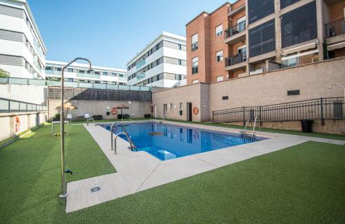 Bola de Oro Apartment | Family-Friendly Serrallo Apartment with Pool & High Ratings