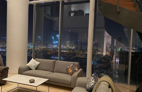 Al Mankhool Apartment | Serviced Room with Unmatched View and Pool Access