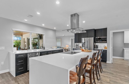 Singer Island Villa | Seven Palms Waterfront: Private Dock & Heated Pool Retreat