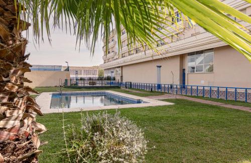 Parque Alcosa Apartment | Inviting SevillaHome: Poolside Retreat with Parking Access