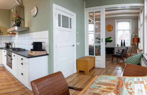 Eenrum Apartment | Unique Stay in Historic Town Hall of Eenrum - Family Friendly