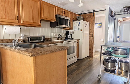 Snowshoe House | Modern EV-Friendly Townhouse with Pool & Lake Views