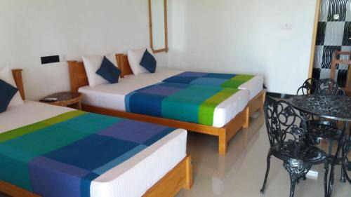 Nilaveli House | Relax at Shan Guest and Restaurant with Oceanfront Views
