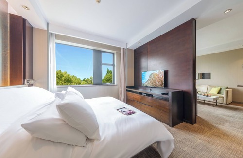 Pudong Hotel | Experience Parkyard Hotel Shanghai: 5-Star Comfort & Spa