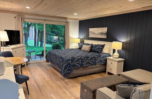 Bellaire House | Pet-Friendly Hilltop Condo with Oceanfront Sunset Views