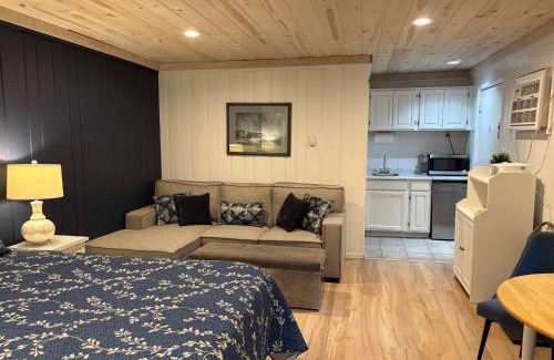 Bellaire House | Pet-Friendly Hilltop Condo with Oceanfront Sunset Views