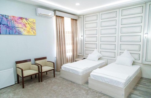 Namangan Hotel | Discover Shedevr Plaza: Poolside Retreat for Families