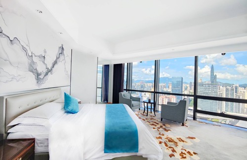 Huaqiang North Hotel | Discover Shenzhen Huaqiang Plaza Hotel: 4-Star Comfort Awaits