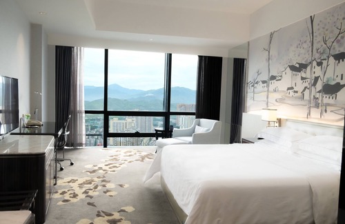 Huaqiang North Hotel | Discover Shenzhen Huaqiang Plaza Hotel: 4-Star Comfort Awaits