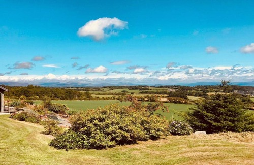 Rhyd-y-clafdy Ski Chalet | Shepherd's Hut on Llŷn Peninsula by Private Lake