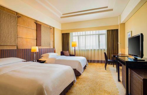 Houjie Hotel | Beachfront Relaxation at Sheraton Dongguan Hotel