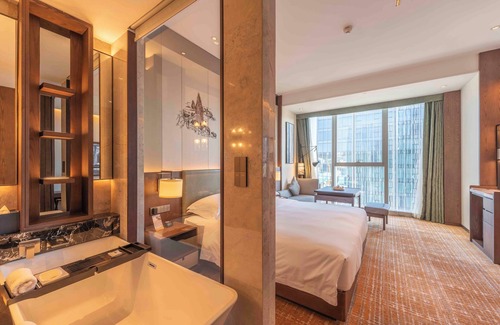 Guandu Hotel | Elegant Sheraton Kunming: Spa, Pool & Family-Friendly Comfort