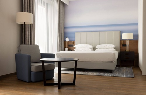 L'Arenas Hotel | Discover Sheraton Nice Airport: Eco-Friendly Comfort & Pool