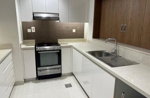 Deira Apartment | Comfort at Sherina Plaza 2: Poolside Family Retreat