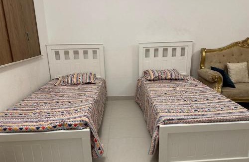 Deira Apartment | Comfort at Sherina Plaza 2: Poolside Family Retreat