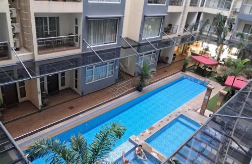 Malabanias Apartment | Sheryll Escapes - La Grande1 BR 304 with balcony, Netflix & WiFi
