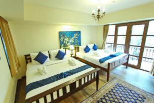 Wat Ket Hotel | Discover Shewe Wana Suite Resort with Pool and Hot Tub