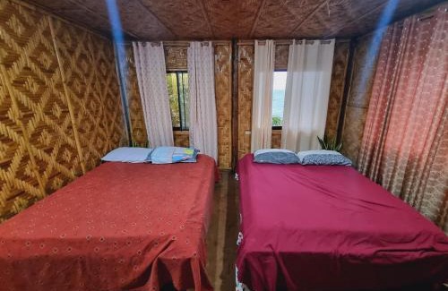 Mambajao House | Top-Rated Shey's Travellers Inn with Oceanfront Views
