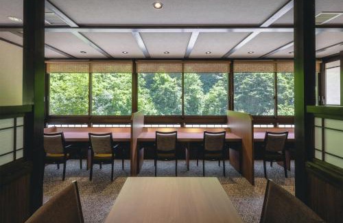 Tenninkyo Onsen Hotel | Experience Shikishimaso: Family-Friendly Getaway with Hot Tub
