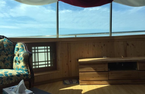 Seongsan House | Oceanfront Bliss at Shinyang Beach Pension - Rated 10/10