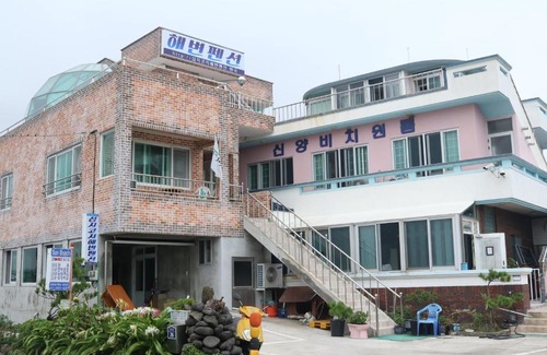 Seongsan House | Oceanfront Bliss at Shinyang Beach Pension - Rated 10/10