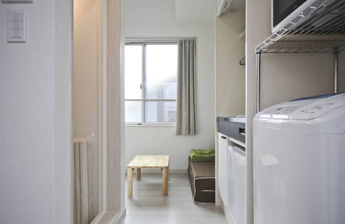 Sumida Apartment | Discover SHITAMACHI BASE: Cozy Room with Skytree Views