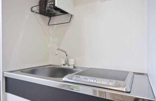 Sumida Apartment | Discover SHITAMACHI BASE: Cozy Room with Skytree Views