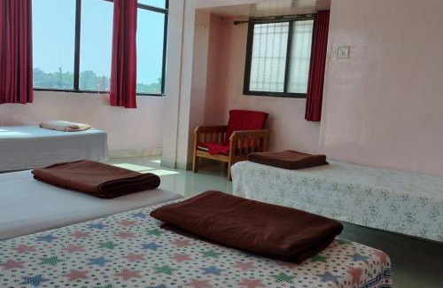 Ellora House | Welcoming Shivam Residency: Breakfast & Child-Friendly Stay