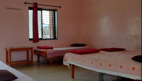 Ellora House | Welcoming Shivam Residency: Breakfast & Child-Friendly Stay