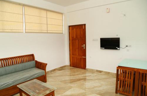 Kozhikode Apartment | Cozy Shoreline Homestay: Family-Friendly Retreat Awaits