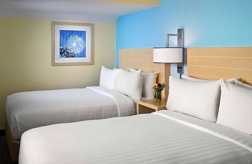 Omaha Hotel | Convenient Getaway Near Orpheum Theater with Private Kitchen