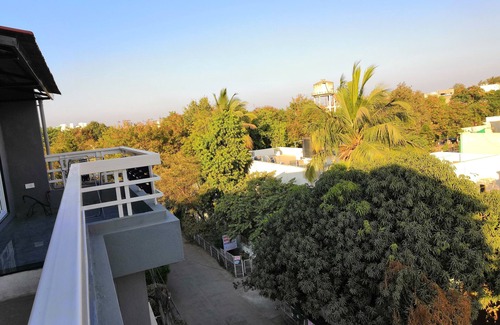 Indore House | Discover Shrivardhan Homestay Penthouse Near City Attractions