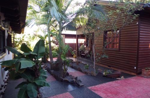Puerto Iguazu Hotel | Cozy Stay at Si Mi Capitán: Oceanfront Cabañas Awaits!